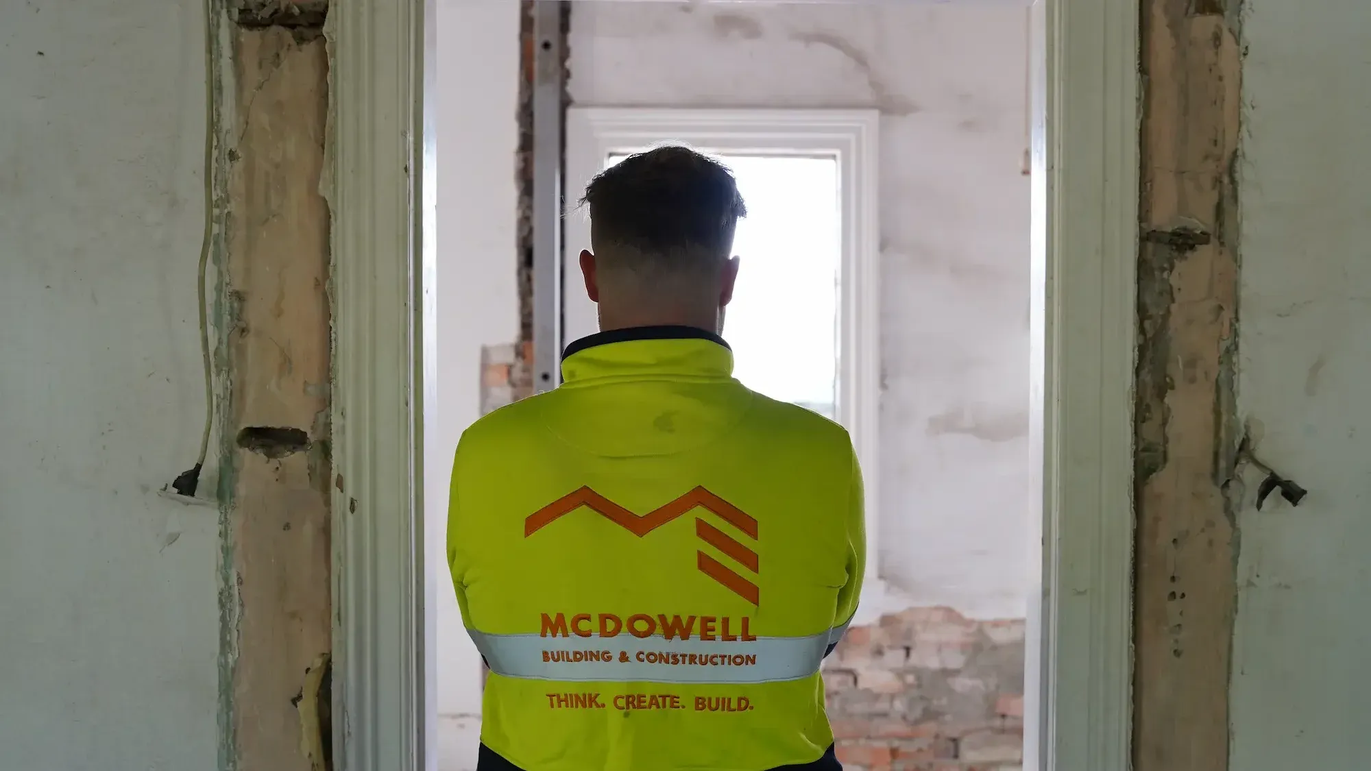McDowell builder assessing a work site
