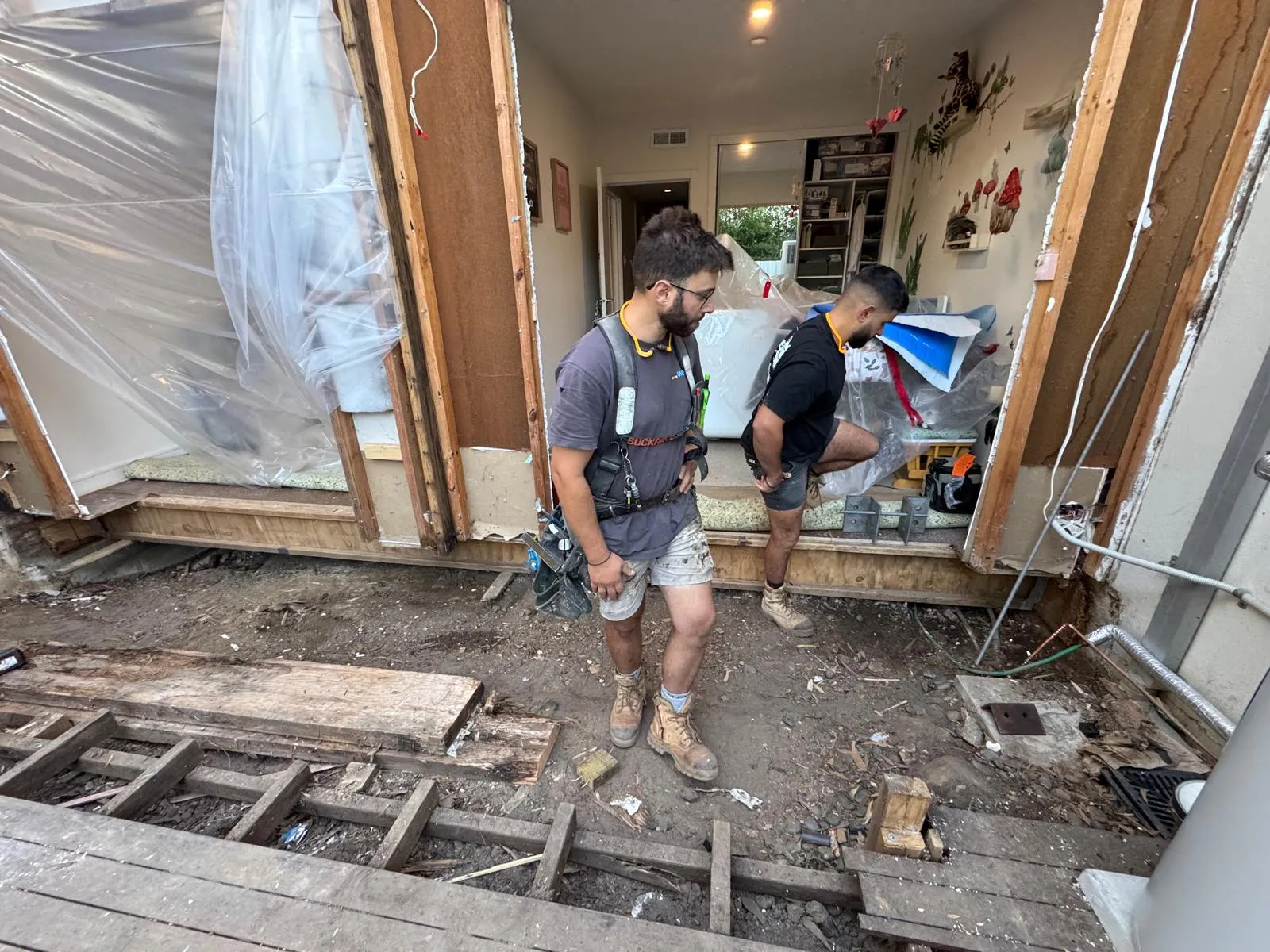 The crew rebuilding balcony joists