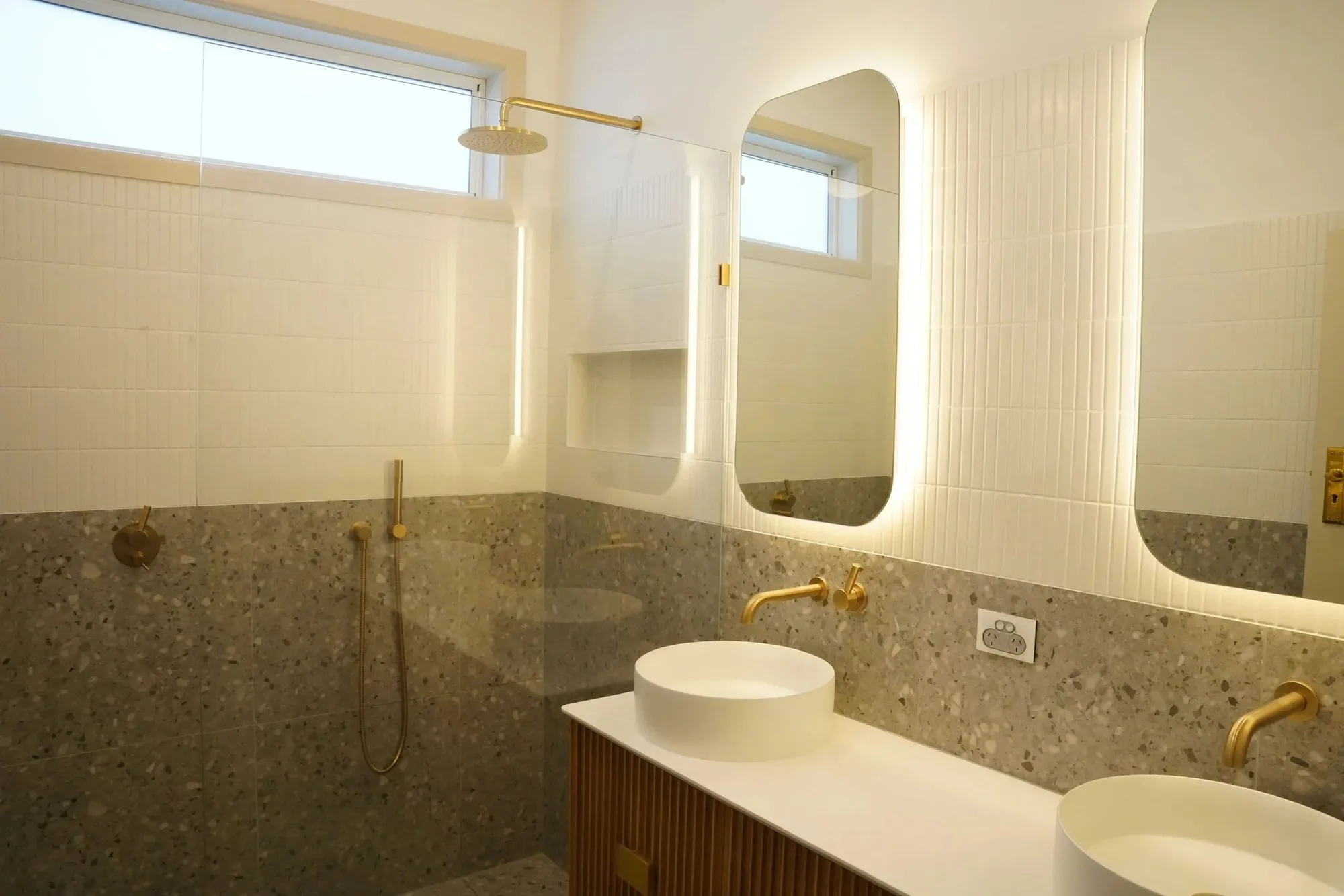 Stone vanity in a completed bathroom renovation