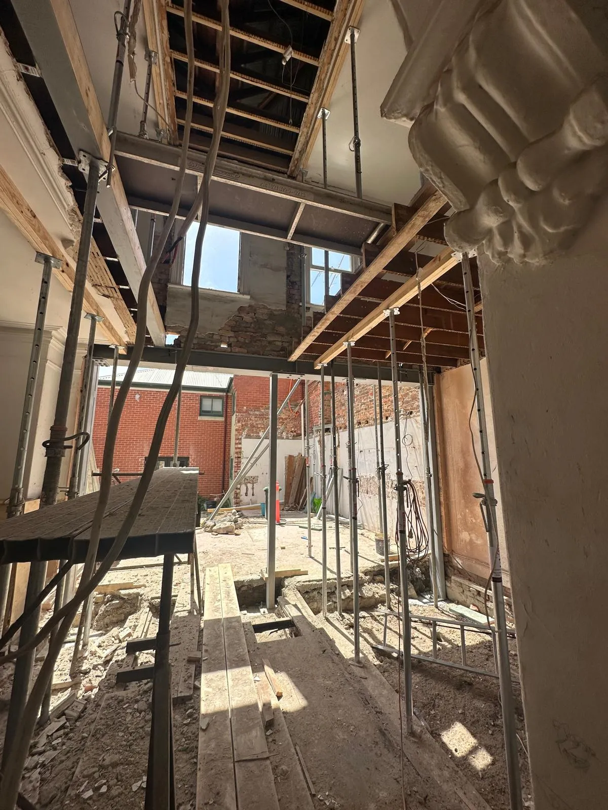 Solid brick walls opened up, Carlton
