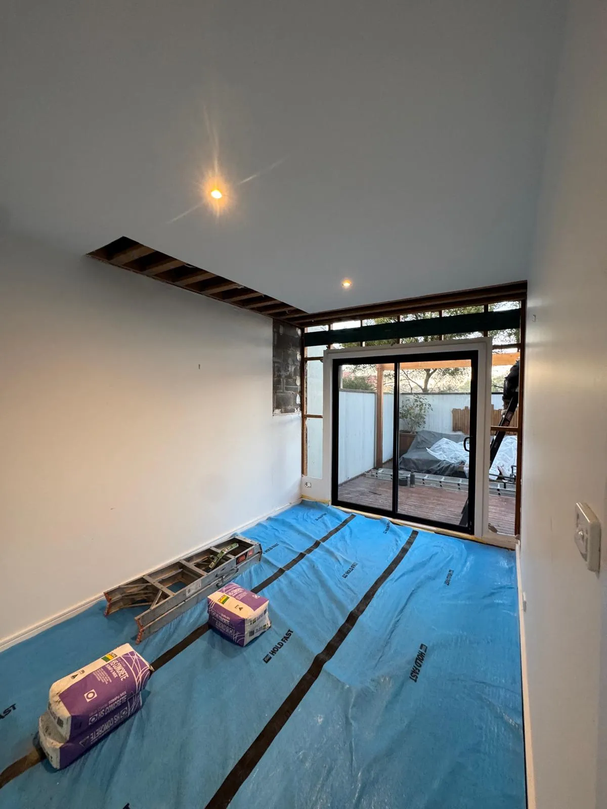 Ceiling joists and framing exposed during remedial work