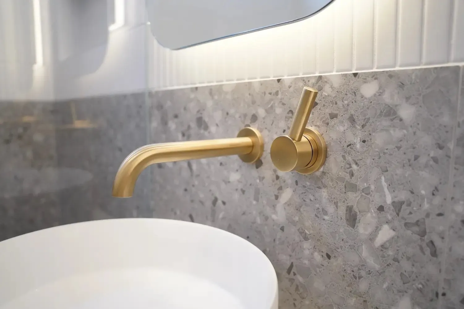 Brass tap detail in a restored period bathroom