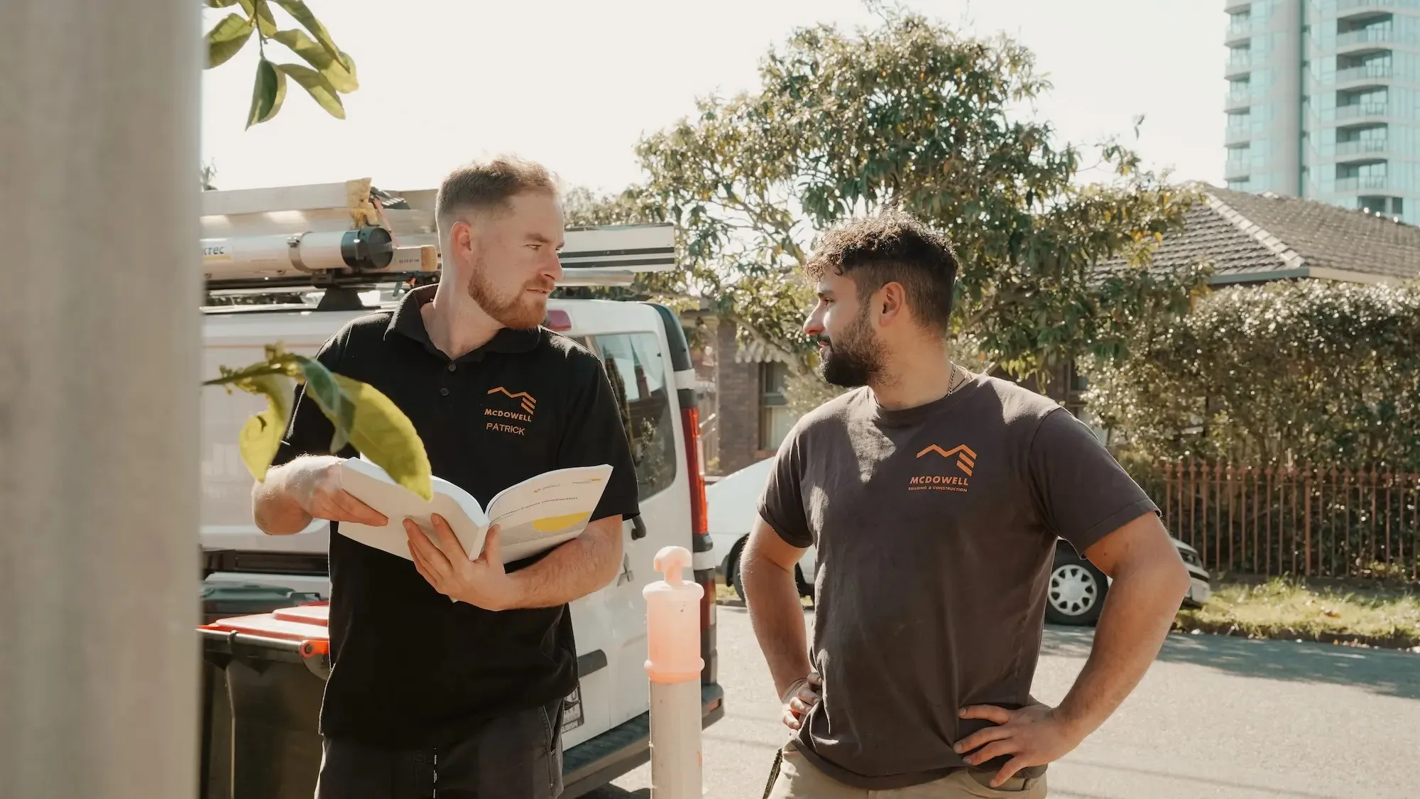 The McDowell team reviewing plans at the van